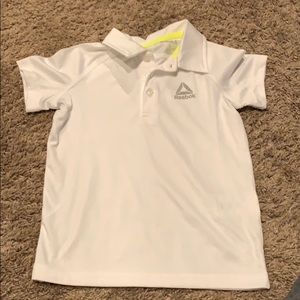 Boys Reebok short sleeve white polo. Size 4.